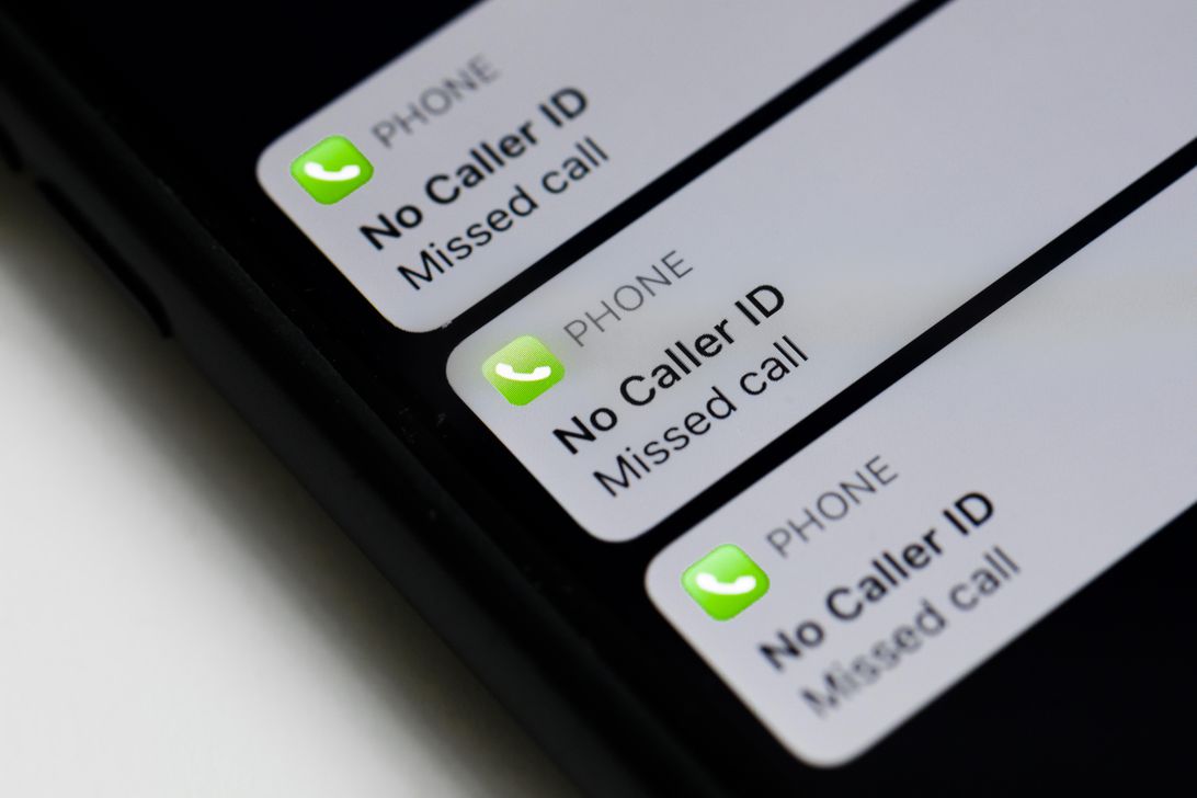 Smartphone screen showing missed calls from "No Caller ID" numbers.